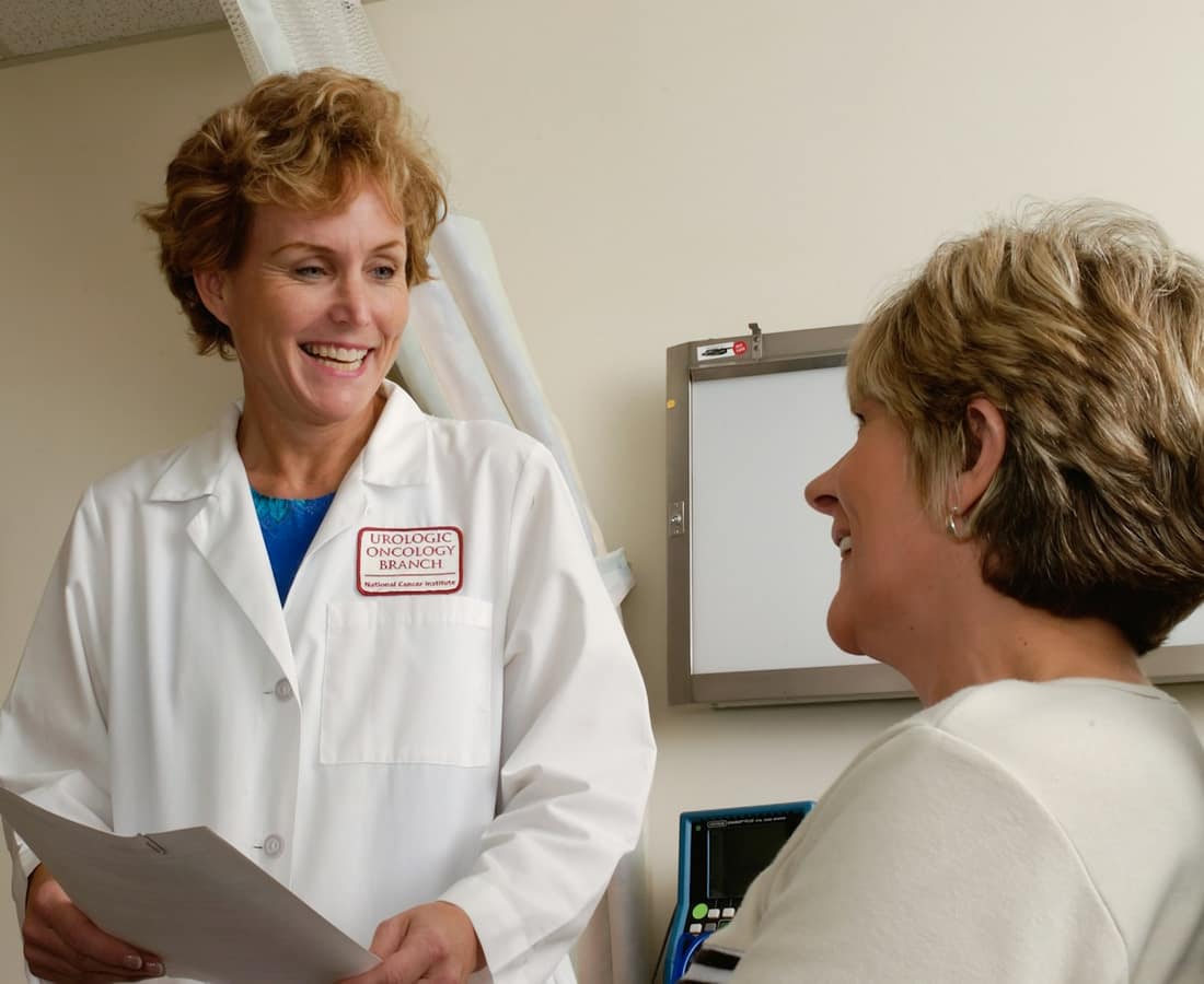 Clinician reviewing care information with a colleague